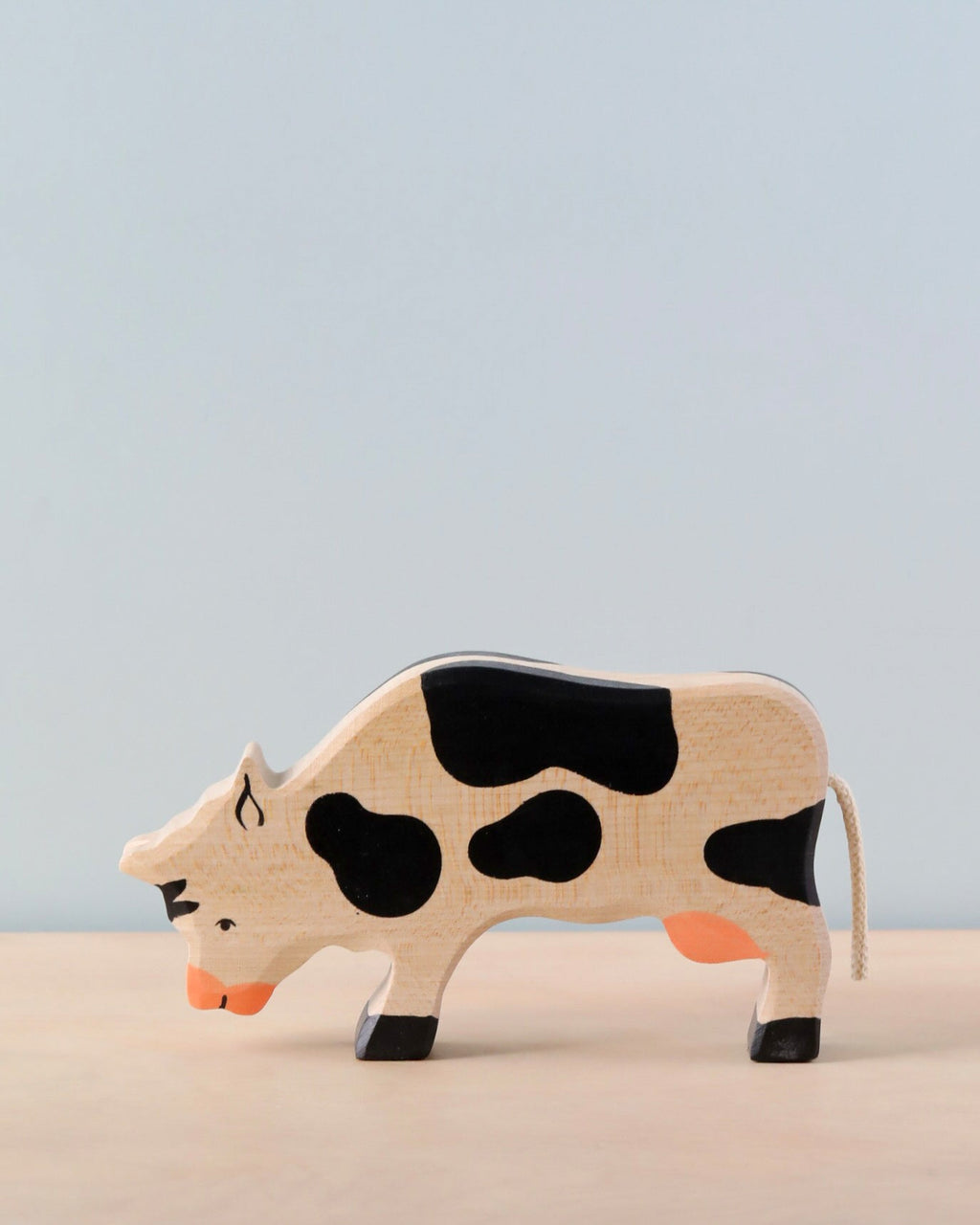 Wooden Grazing Black Cow Figure