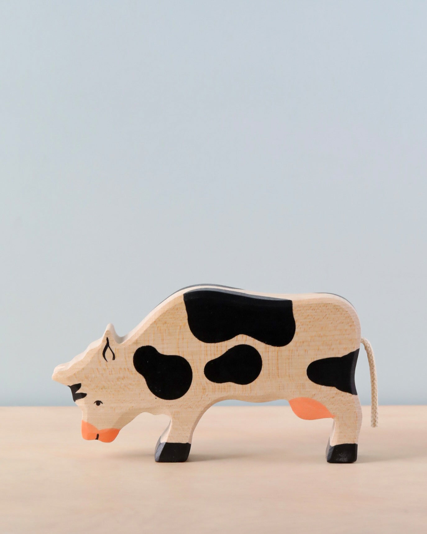 Wooden Grazing Black Cow Figure